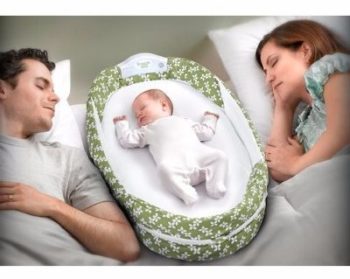 #7. Snuggle Nest Surround Portable Infant Sleeper